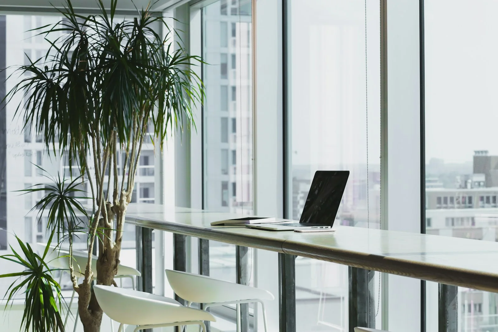 Bright office workspace with a laptop